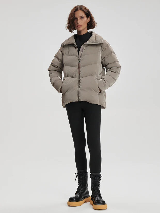 Black Liquid Nylon Puffer Jacket with Snap Pockets by TLJ