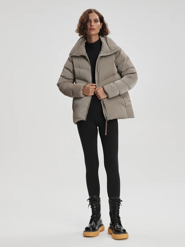Black Liquid Nylon Puffer Jacket with Snap Pockets by TLJ