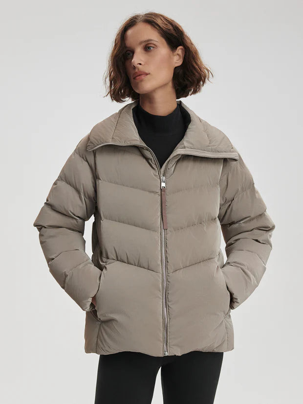 Black Liquid Nylon Puffer Jacket with Snap Pockets by TLJ