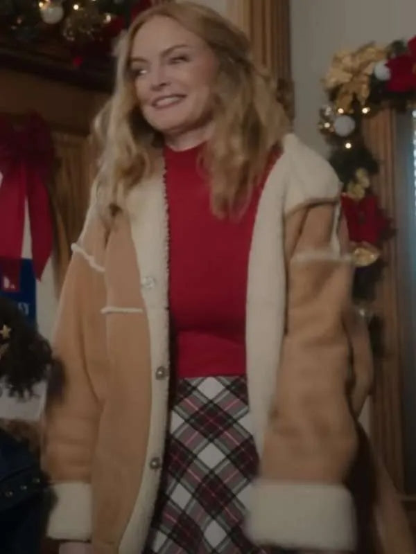 Heather Graham brown suede shearling jacket from Best Christmas Ever 2023