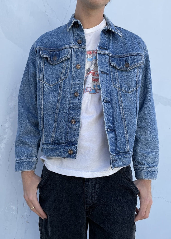Vintage LLW denim jacket in classic blue with button closure and chest pockets