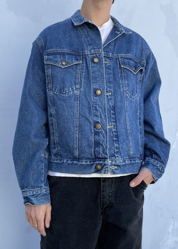 Vintage LLW denim jacket in classic blue with button closure and chest pockets