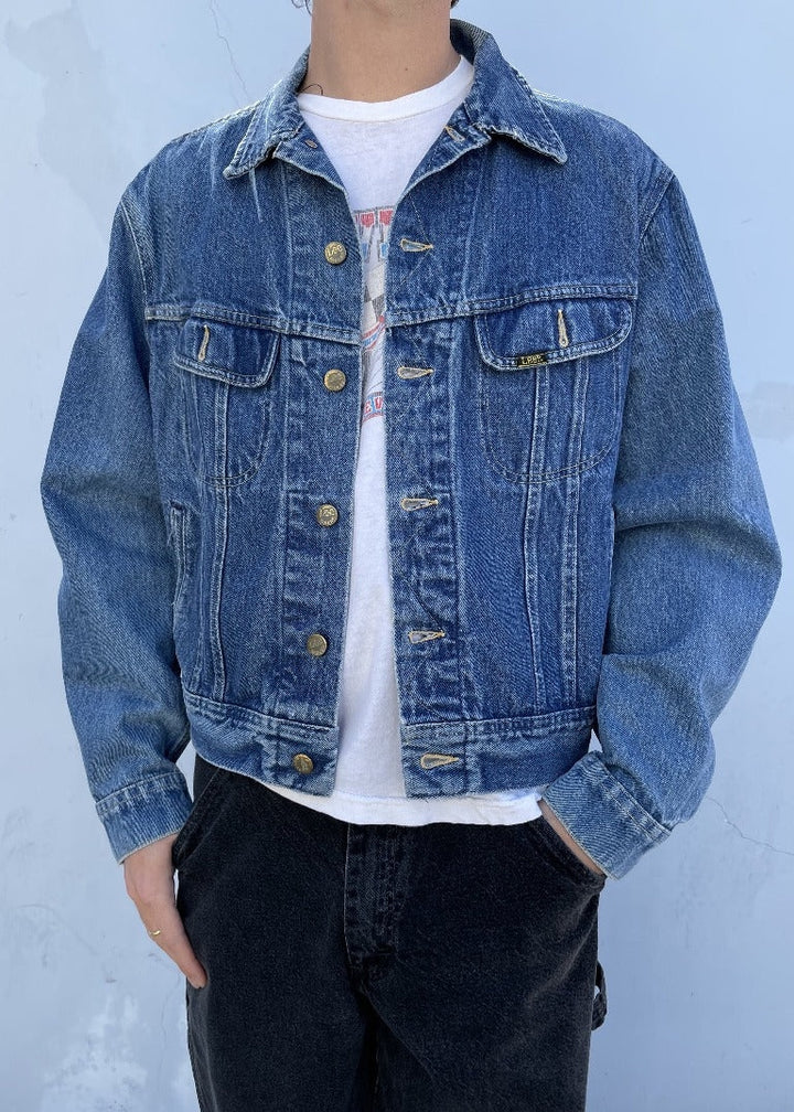 Vintage LLW denim jacket in classic blue with button closure and chest pockets