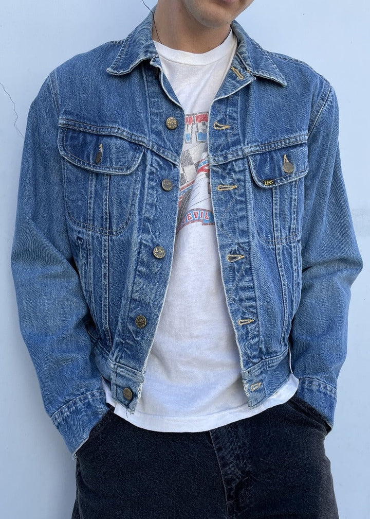 Vintage LLW denim jacket in classic blue with button closure and chest pockets
