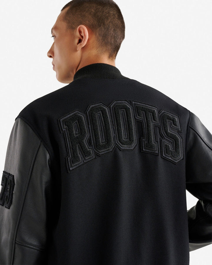 Men’s Vintage Varsity Jacket with leather sleeves and chenille crests – classic collegiate style.