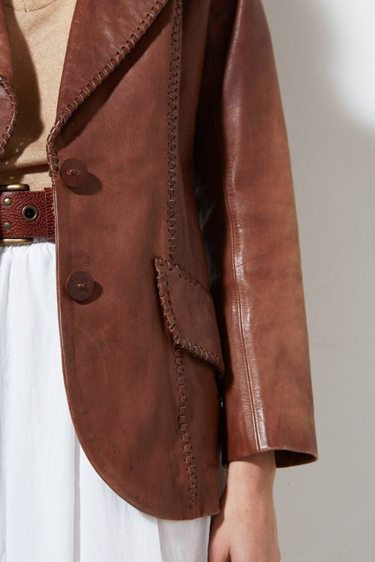Vintage brown handmade leather jacket with whipstitch detailing
