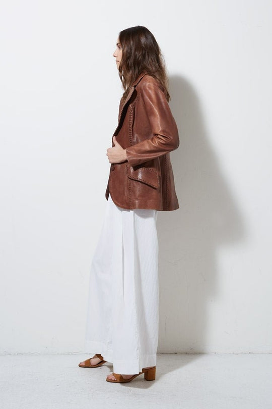 Vintage brown handmade leather jacket with whipstitch detailing
