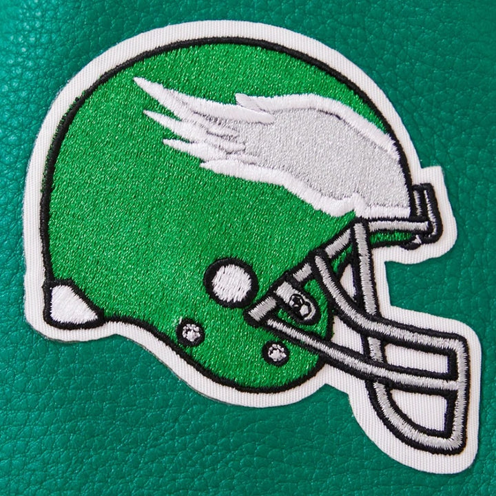 Women’s Philadelphia Eagles white and green varsity jacket with wool body and leather sleeves
