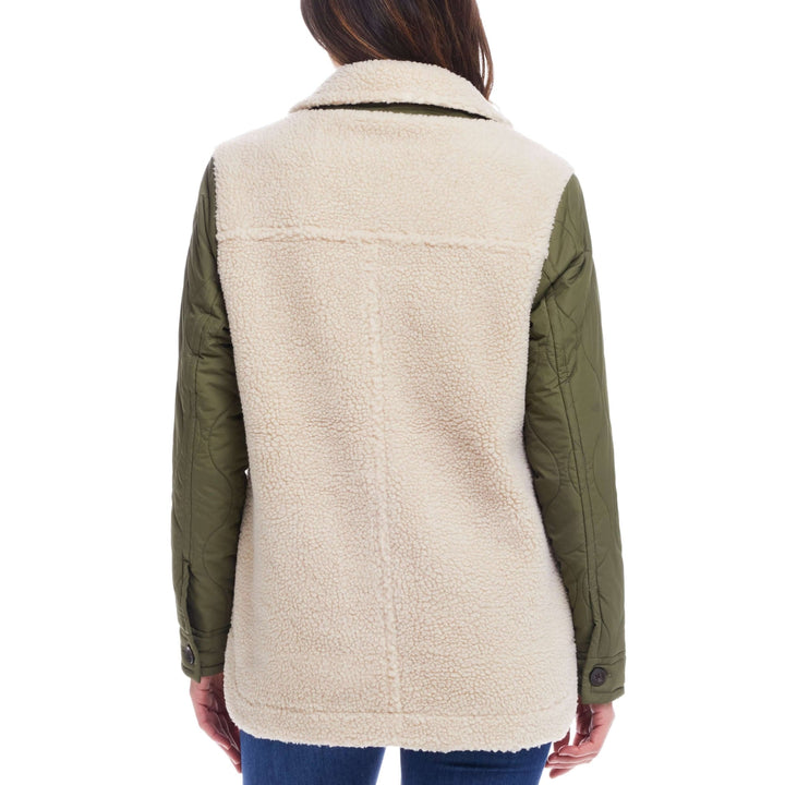Women’s green quilted mixed media jacket with faux shearling and quilted sleeves.
