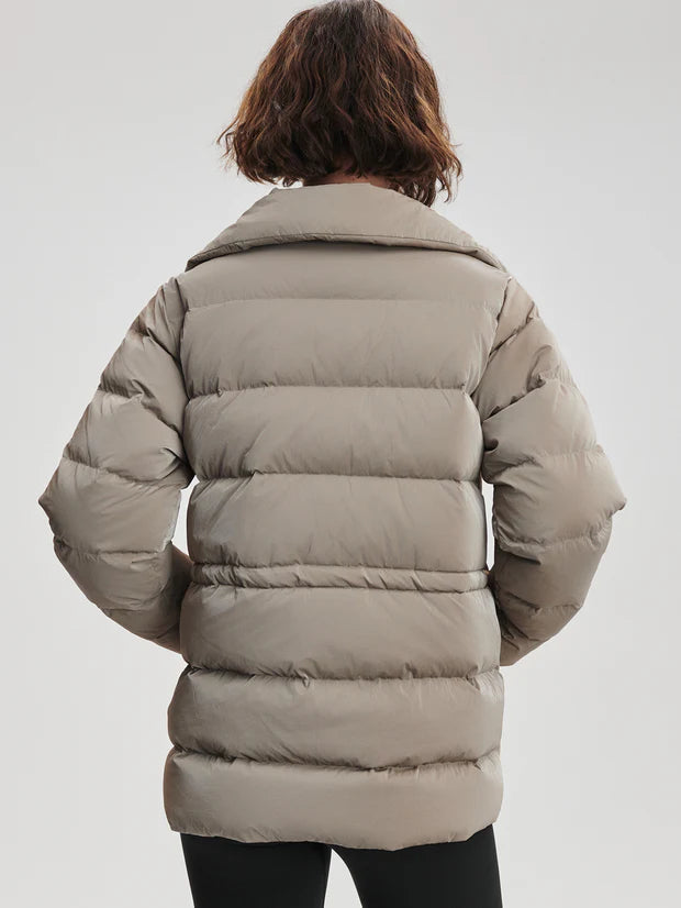 Black Liquid Nylon Puffer Jacket with Snap Pockets by TLJ